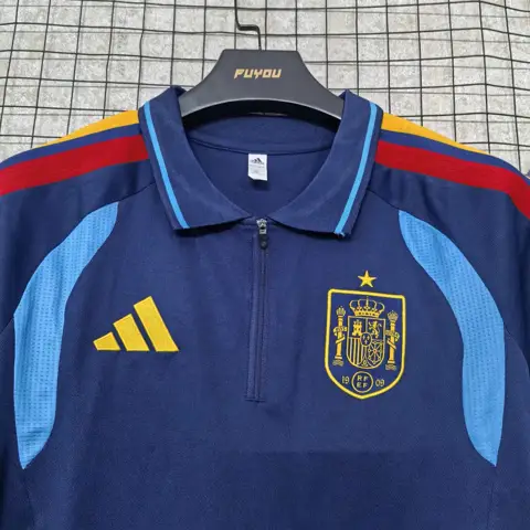 Spain Blue Polo — 2026/27