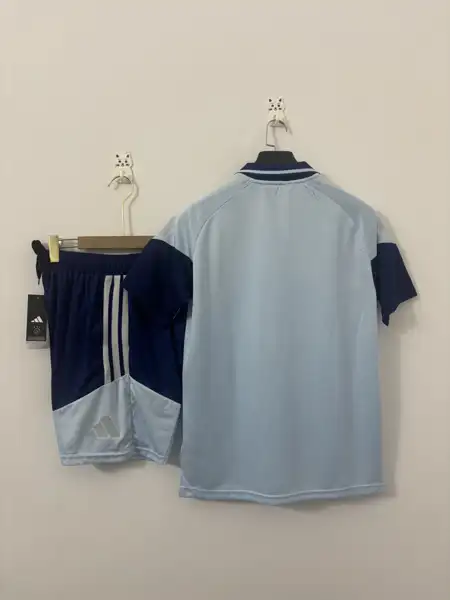 Ajax Sky Blue Polo Shirt Set — 2026/27