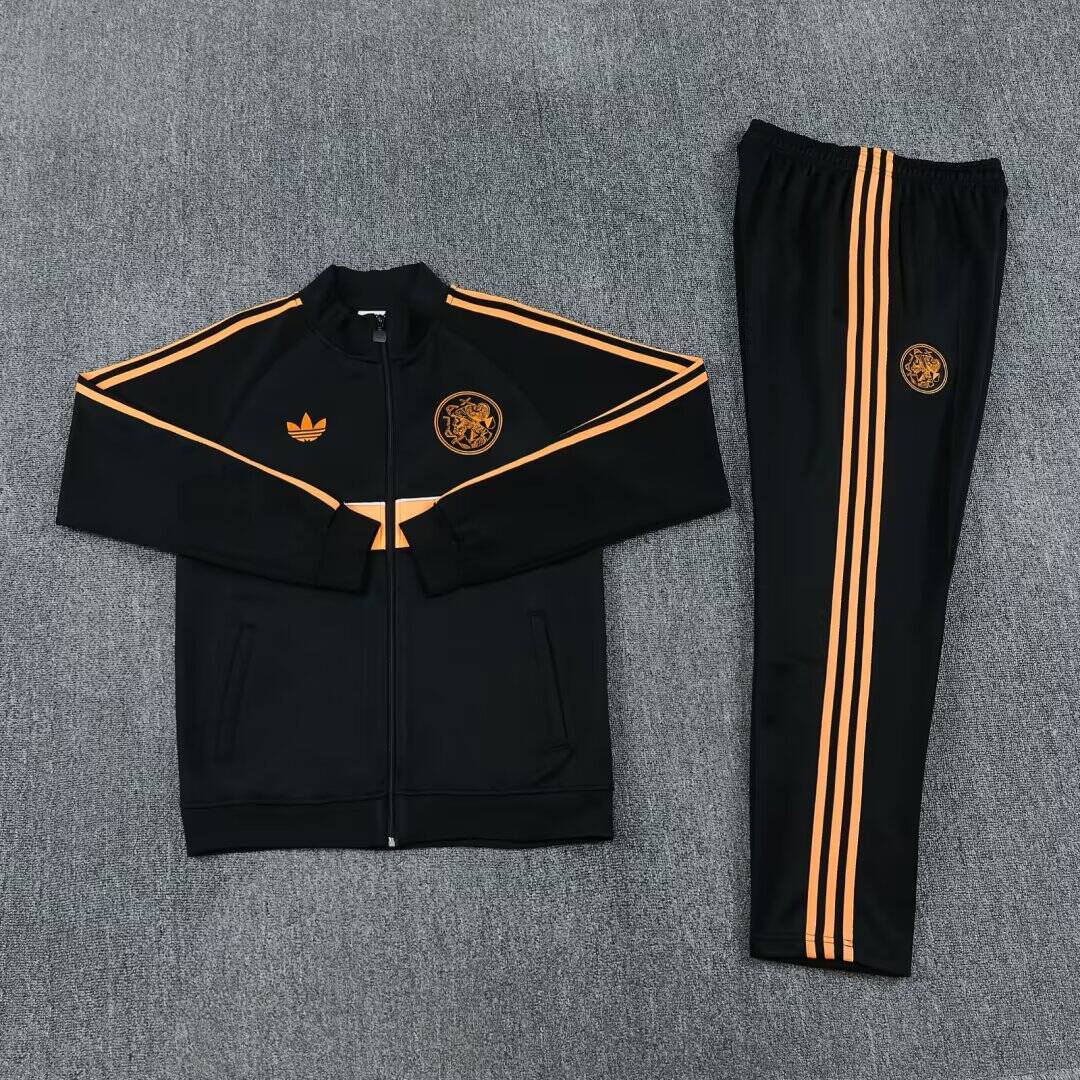 Ajax Amsterdam Trainingsanzug · Schwarz und Orange